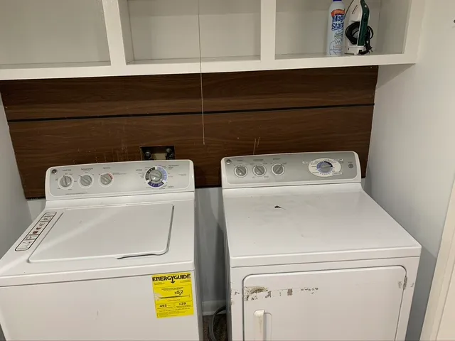 a utility room with dryer and washer