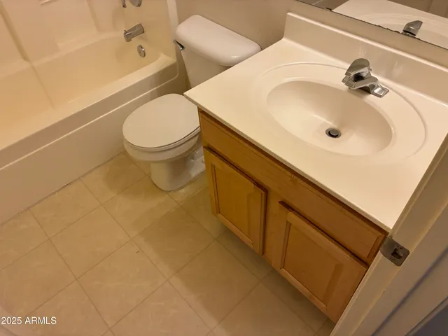 a bathroom with a sink and toilet