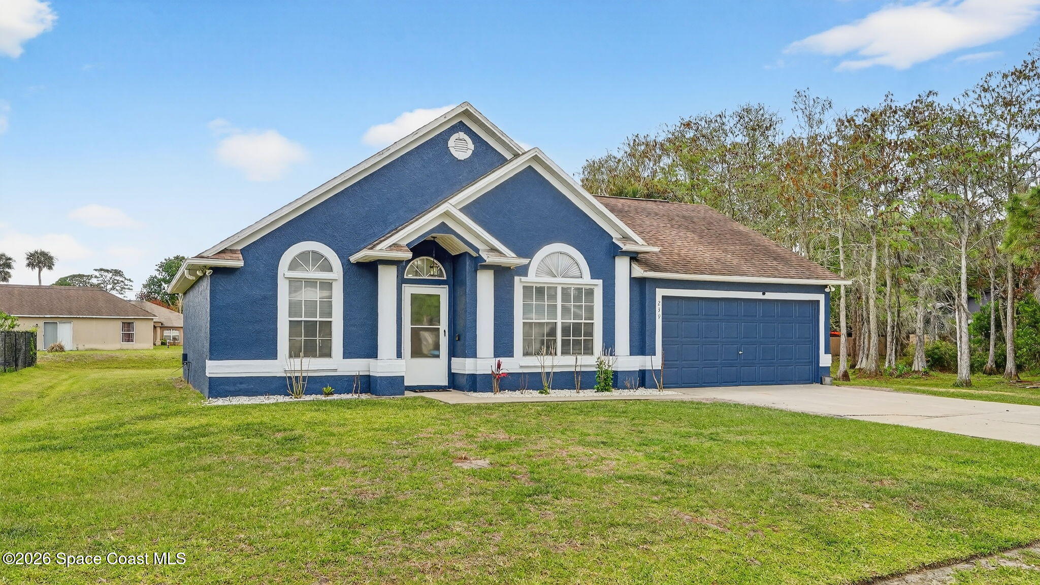 239 Avens Road Northeast Palm Bay, FL 32907 - Photo 3 of 26 3-web-or-mls-DSC06350