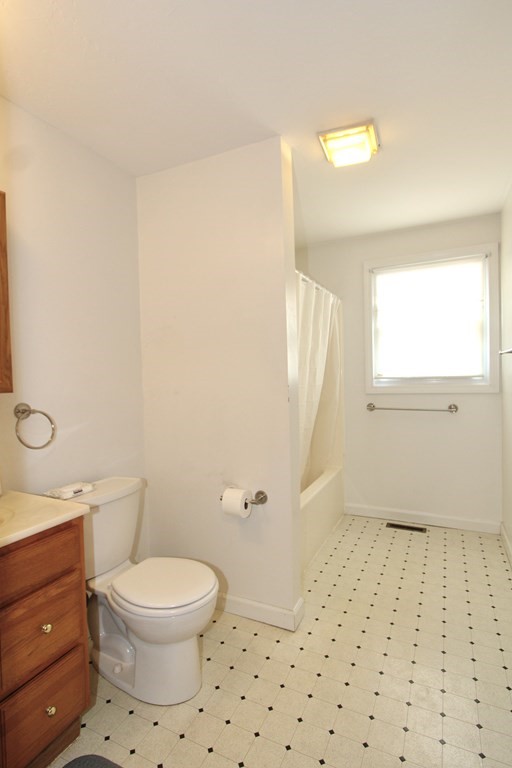8 Timrod Drive Worcester, MA 01603 - Photo 4 of 9 a bathroom with a toilet a sink and shower