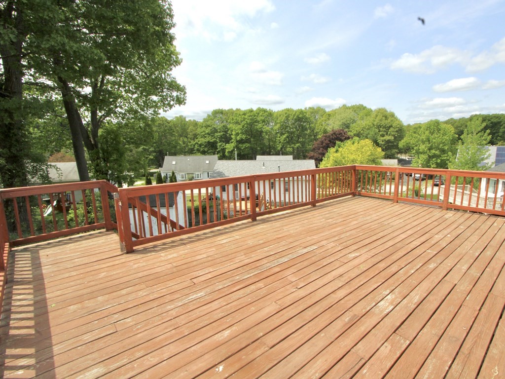 8 Timrod Drive Worcester, MA 01603 - Photo 9 of 9 a view of deck with couches and wooden floor