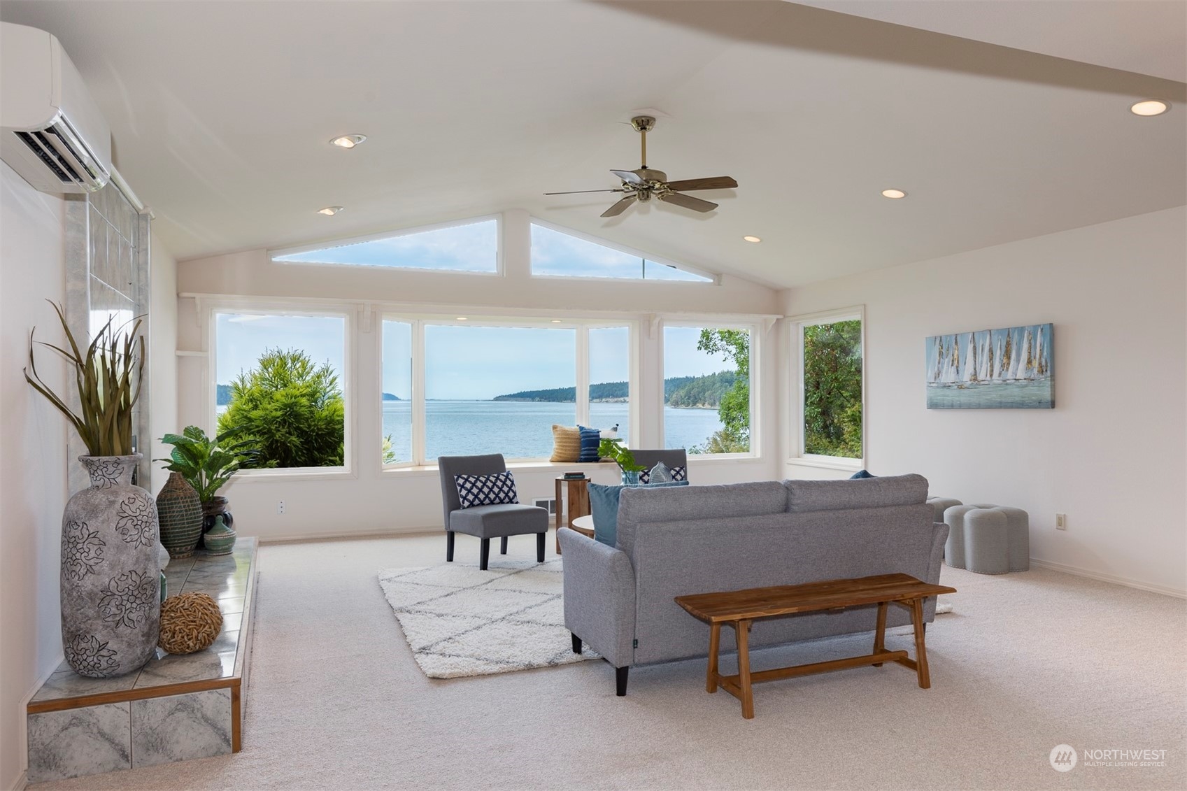 1161 Griffith Point Road Nordland, WA 98358 - Photo 13 of 38 a living room with furniture and a large window