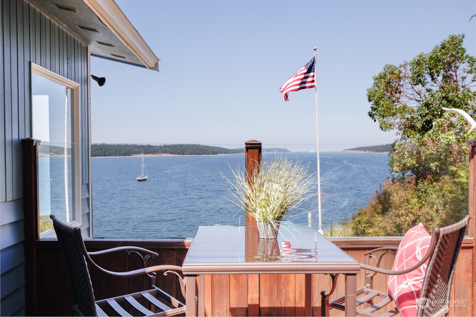 1161 Griffith Point Road Nordland, WA 98358 - Photo 3 of 38 a view of dinning table and chairs in patio