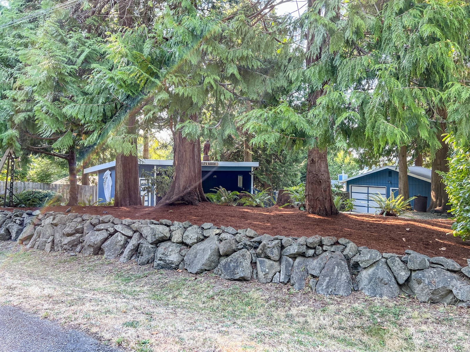 1161 Griffith Point Road Nordland, WA 98358 - Photo 4 of 38 a front view of a house with a yard