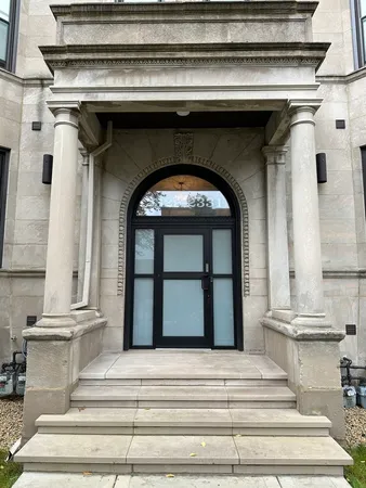 a view of fireplace and window