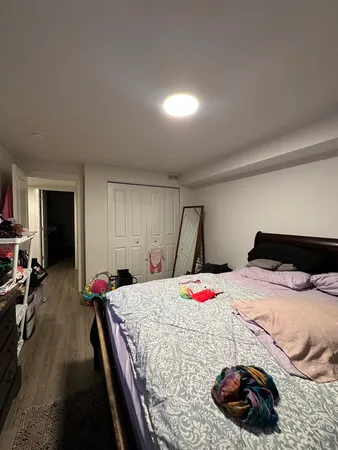 a bed room with a bed and a couch