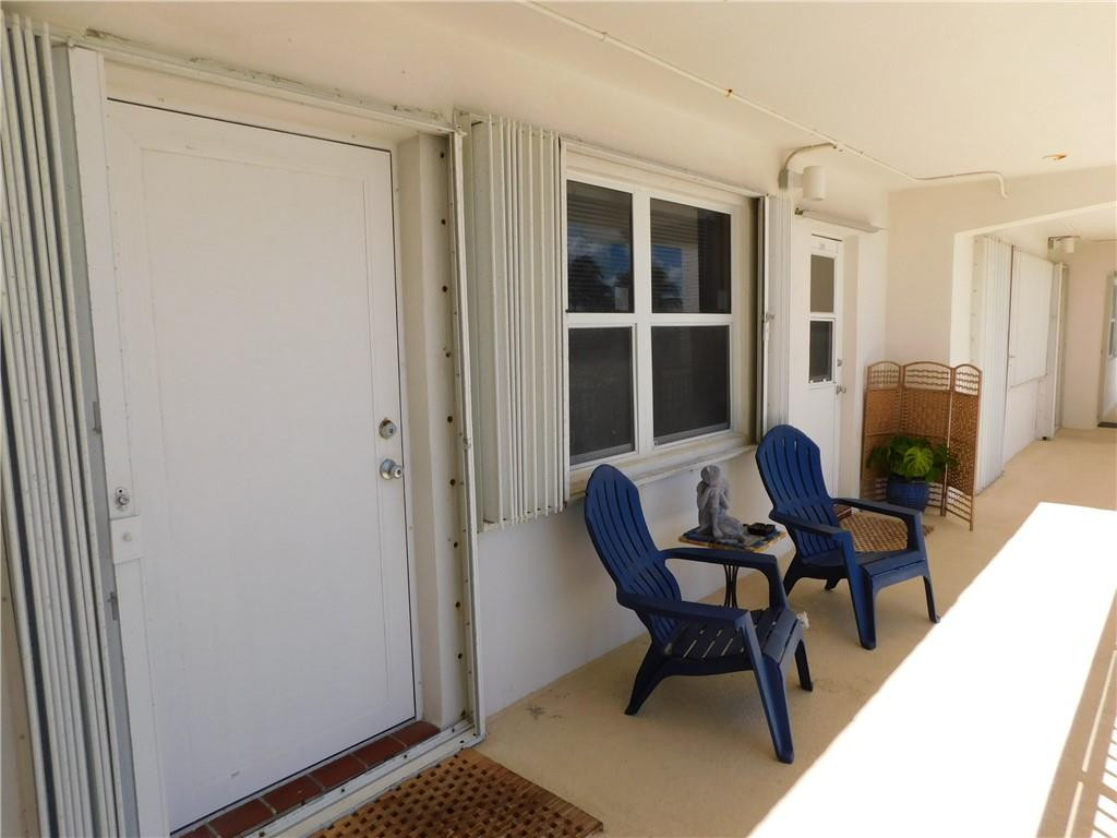 901 South Surf Road, Unit 306 Hollywood, FL 33019 - Photo 11 of 44 a work room with furniture and a window