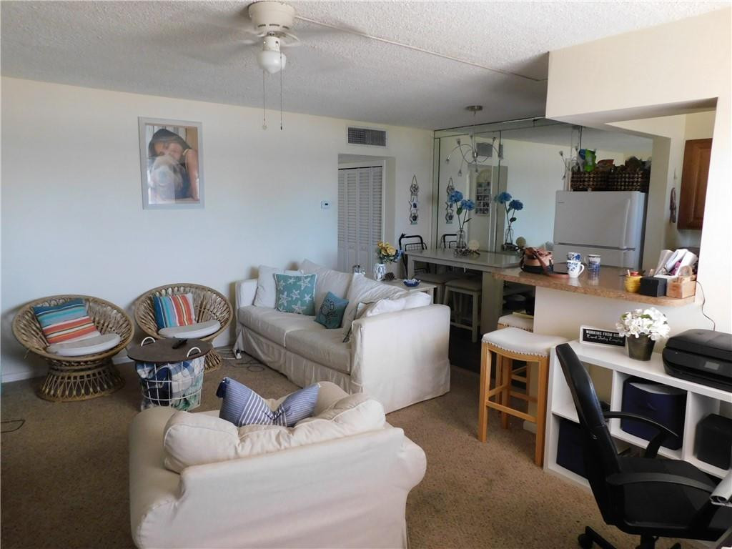 901 South Surf Road, Unit 306 Hollywood, FL 33019 - Photo 19 of 44 a living room with furniture