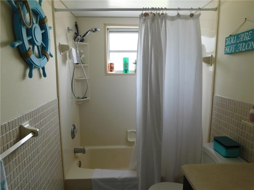 901 South Surf Road, Unit 306 Hollywood, FL 33019 - Photo 30 of 44 a bathroom with a shower and a sink