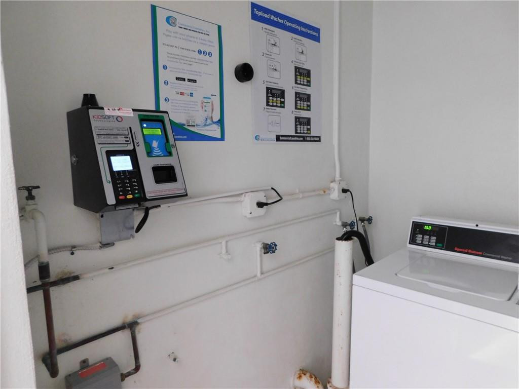 901 South Surf Road, Unit 306 Hollywood, FL 33019 - Photo 33 of 44 a utility room with dryer and washer