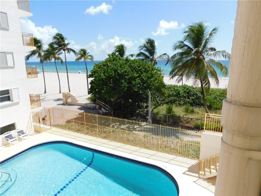 901 South Surf Road, Unit 306 Hollywood, FL 33019 - Photo 38 of 44 a view of a house with a swimming pool