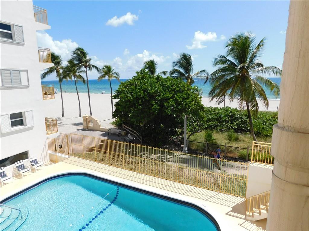 901 South Surf Road, Unit 306 Hollywood, FL 33019 - Photo 39 of 44 a view of a house with a swimming pool
