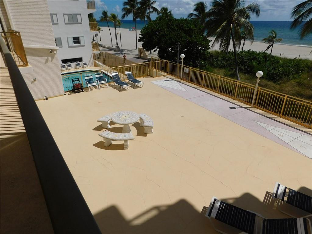 901 South Surf Road, Unit 306 Hollywood, FL 33019 - Photo 40 of 44 swimming pool view with a seating space