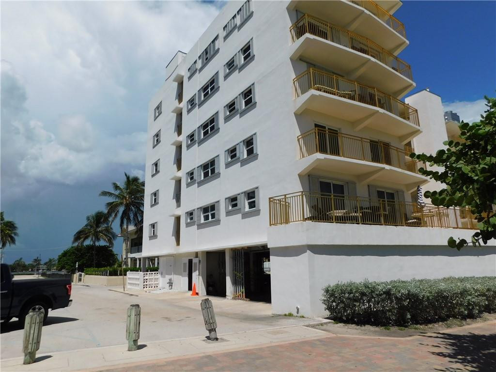 901 South Surf Road, Unit 306 Hollywood, FL 33019 - Photo 6 of 44 a front view of a multi story building