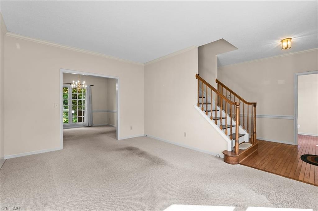 Formal living room that could be used for office space, playroom, etc.