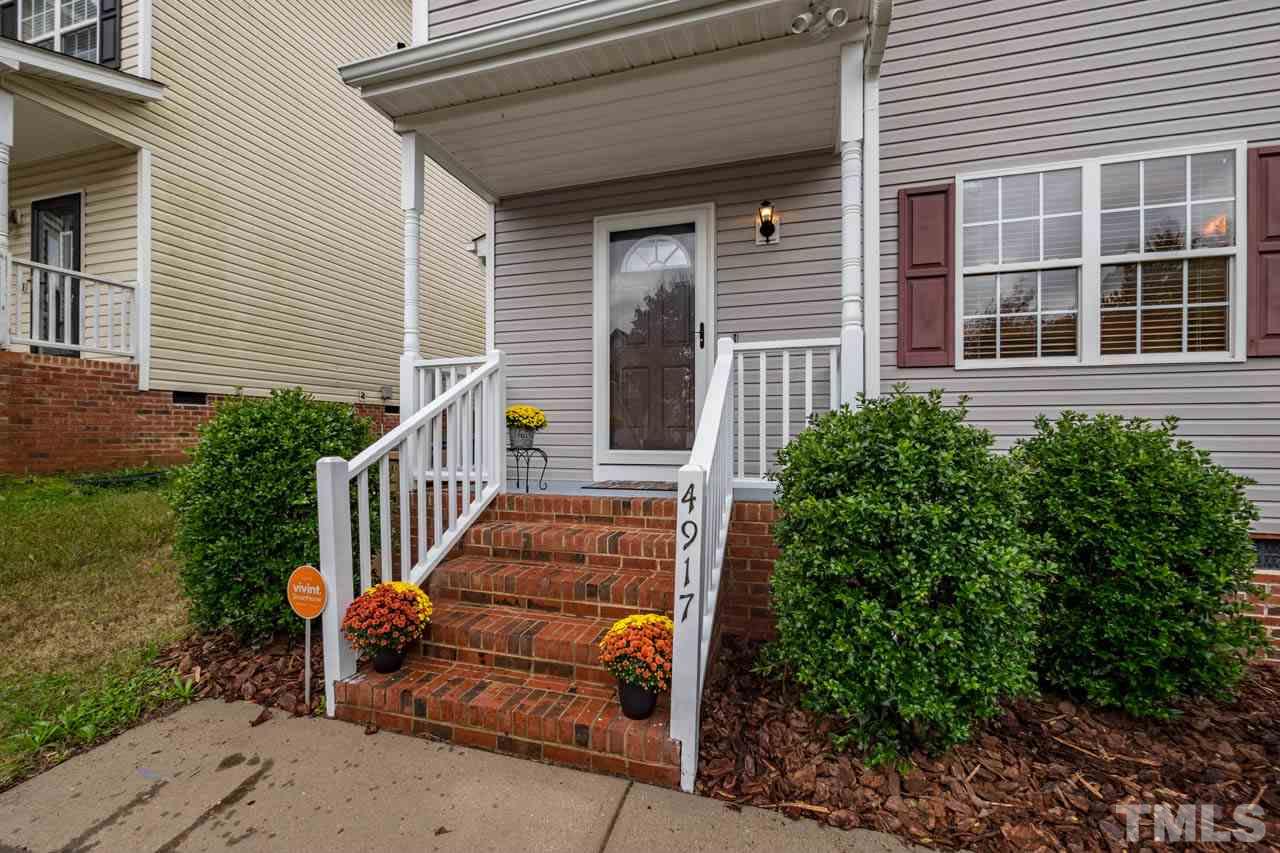 4917 Windproof Way Raleigh, NC 27616 - Photo 2 of 18 a view of a house with staircase and stairs