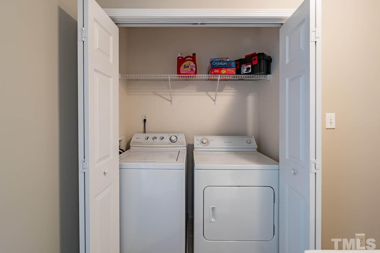 4917 Windproof Way Raleigh, NC 27616 - Photo 15 of 18 a utility room with dryer and washer