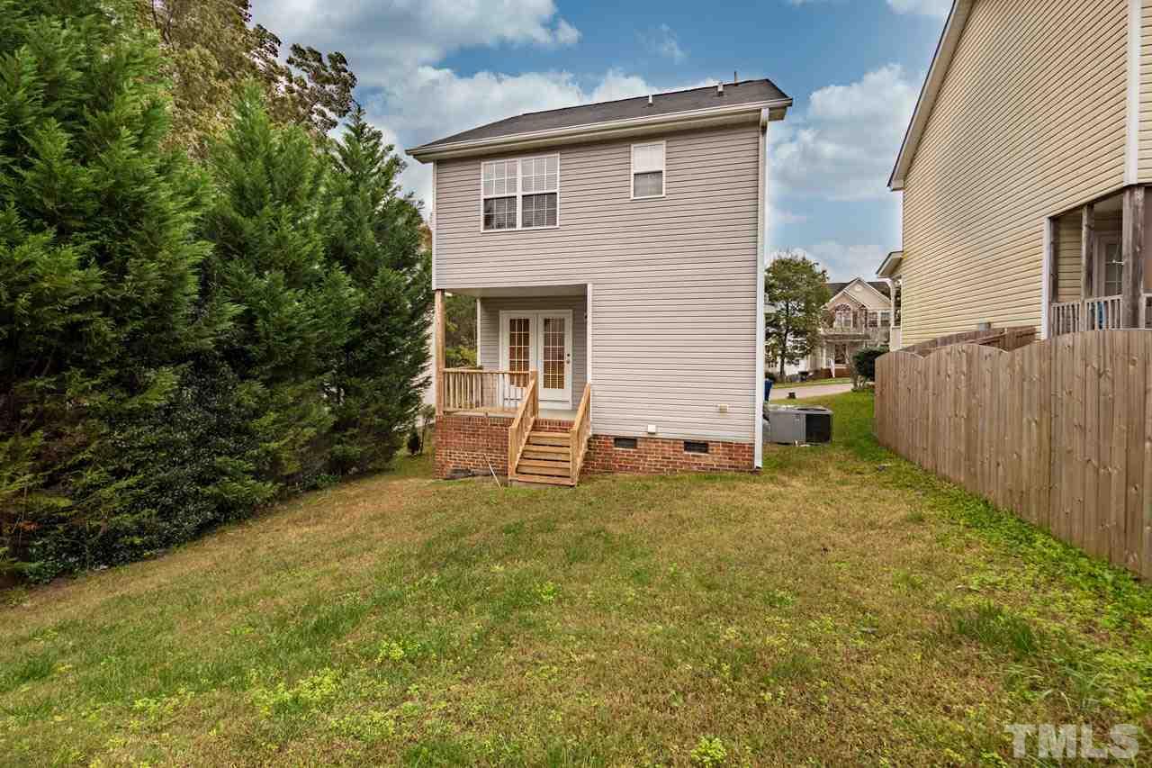 4917 Windproof Way Raleigh, NC 27616 - Photo 17 of 18 a view of a backyard