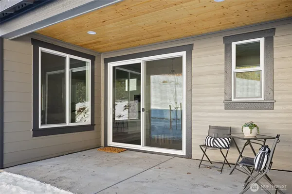 a view of kitchen with furniture and wooden floor