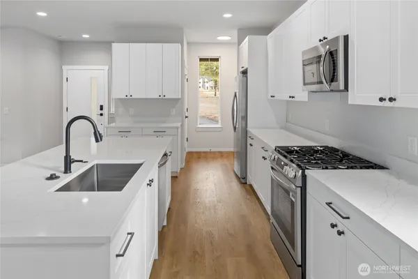 a bathroom with a toilet and a sink