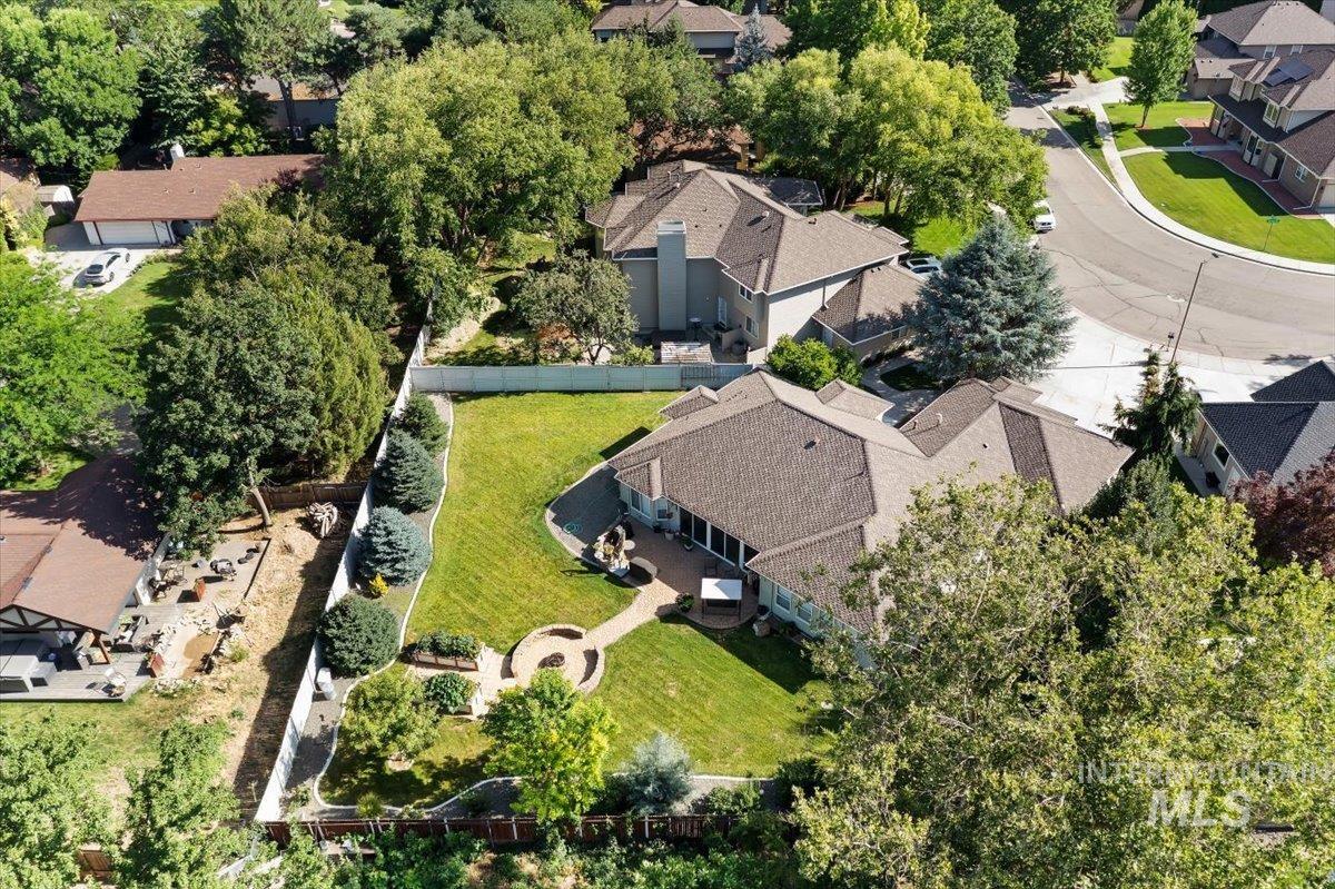 5184 North Greyloch Way Boise, ID 83704 - Photo 27 of 32 Expansive neighborhood featuring mature tree canopy, residential architecture, and distant mountain ranges