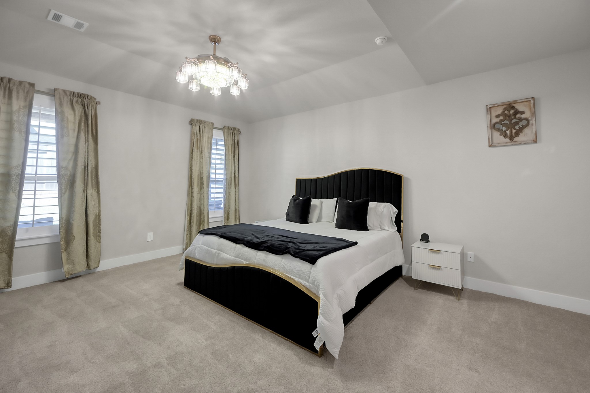 3131 Red Buckeye Lane Conroe, TX 77301 - Photo 17 of 34 a bedroom with a bed and window