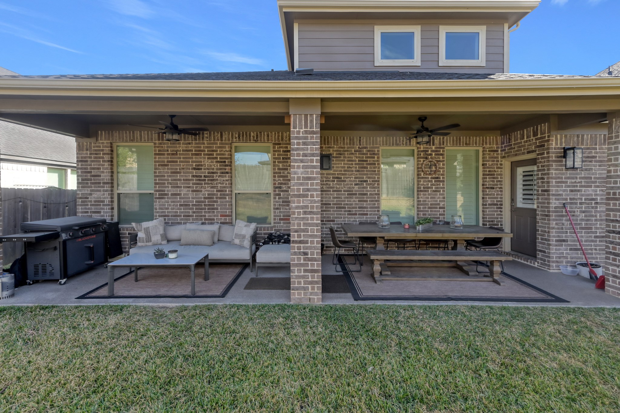 3131 Red Buckeye Lane Conroe, TX 77301 - Photo 34 of 34 a view of a chairs and table in the patio