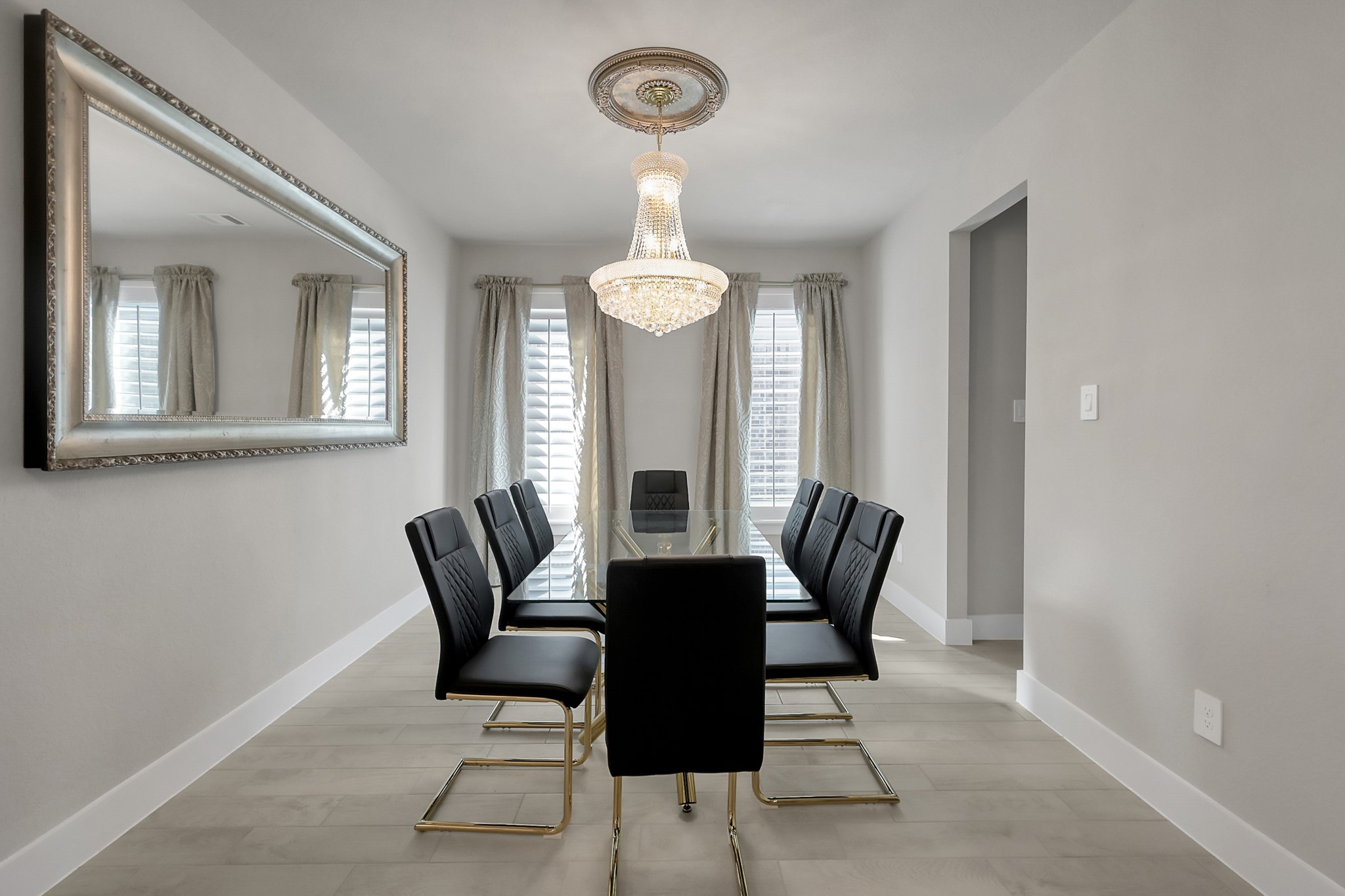 3131 Red Buckeye Lane Conroe, TX 77301 - Photo 5 of 34 a dining room with furniture and window