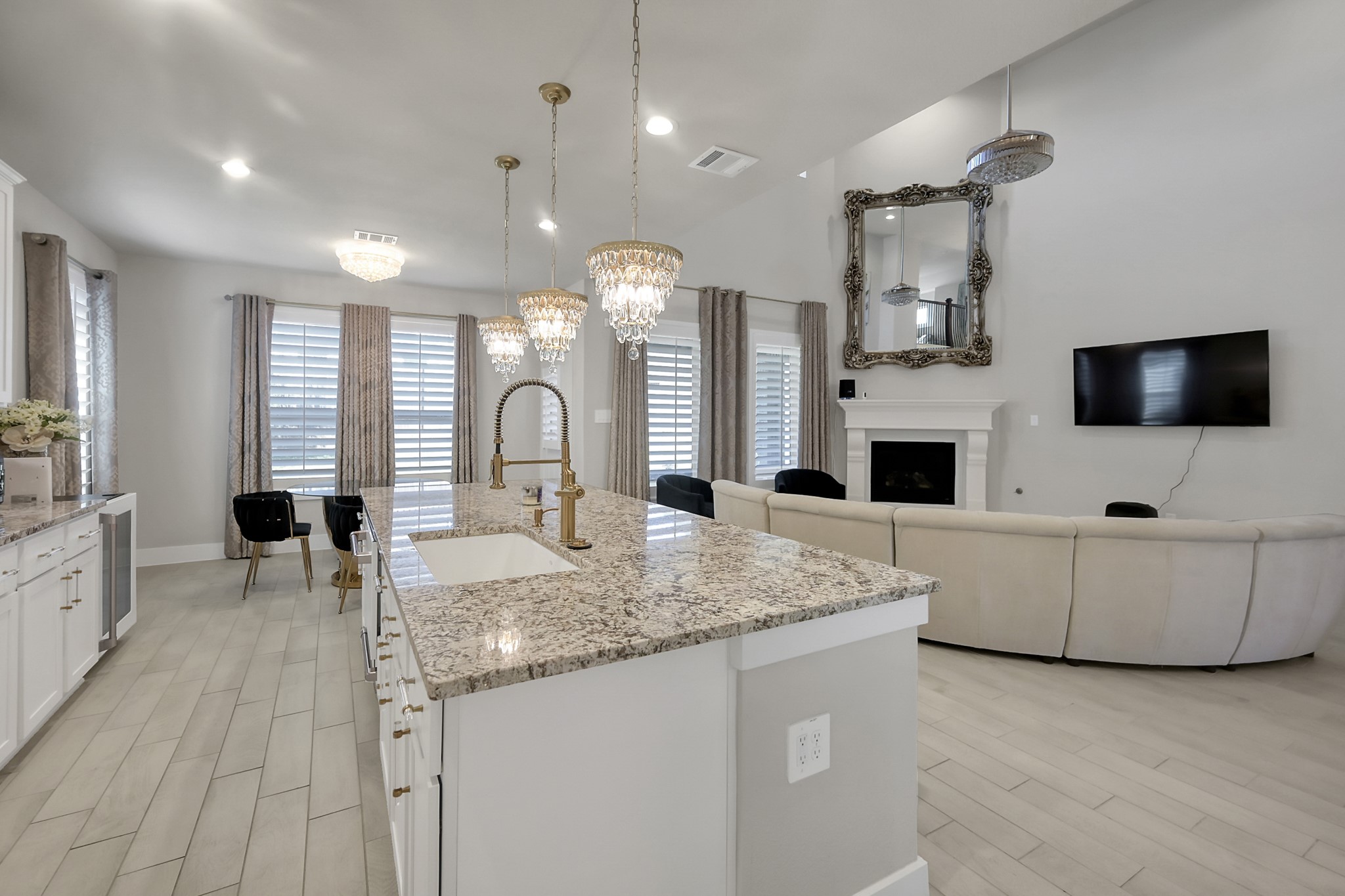 3131 Red Buckeye Lane Conroe, TX 77301 - Photo 9 of 34 a living room with furniture and a flat screen tv