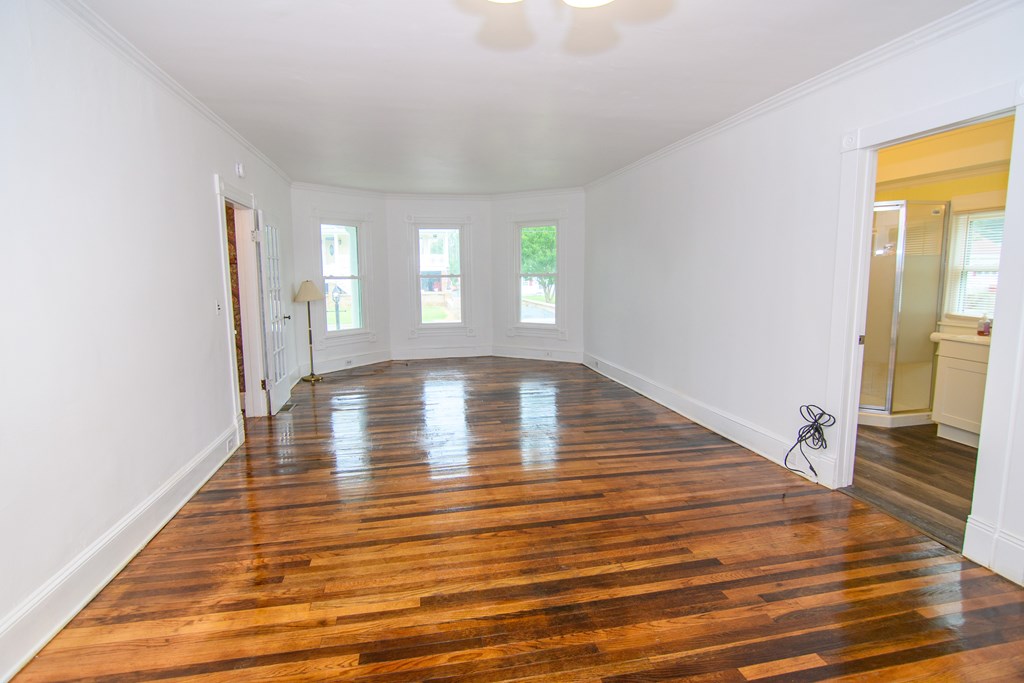 23482 Saxis Road Sanford, VA 23426 - Photo 7 of 37 Living Room view 3, The door to the right is access to Bath/Laundry Room
