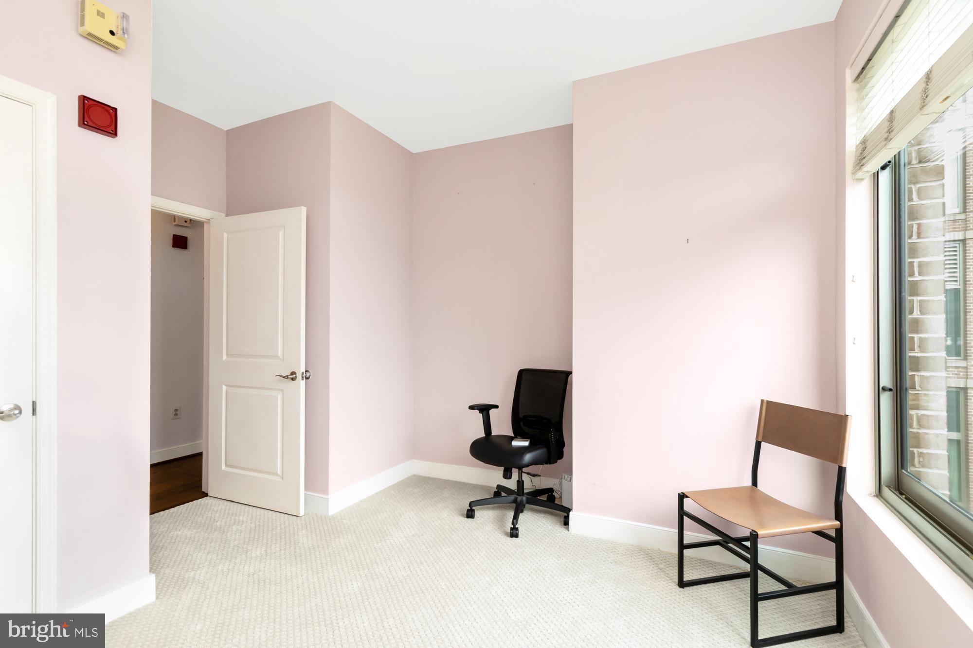 675 President Street, Unit 1406 Baltimore, MD 21202 - Photo 18 of 30 a view of a workspace with furniture and a window