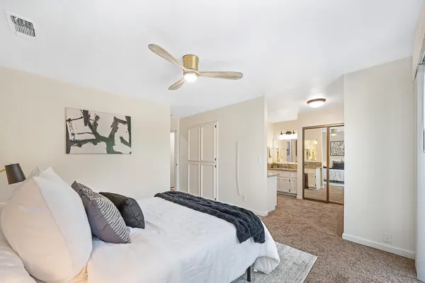 a outdoor living space with furniture and a potted plant