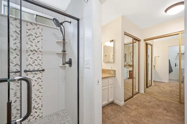 a view of a house with backyard and a tree