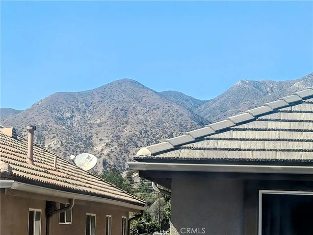 a terrace of a house with mountain view
