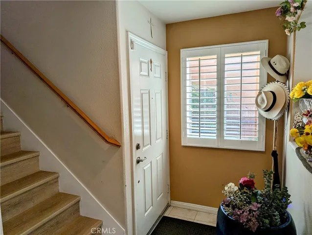 a view of entryway with wooden floor and a flower pot
