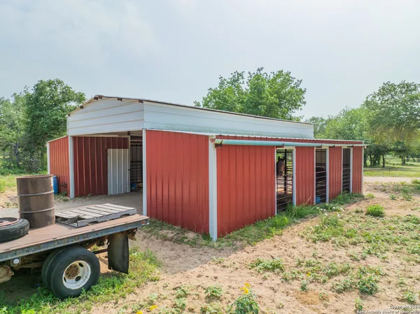 a wooden door in front of a house
