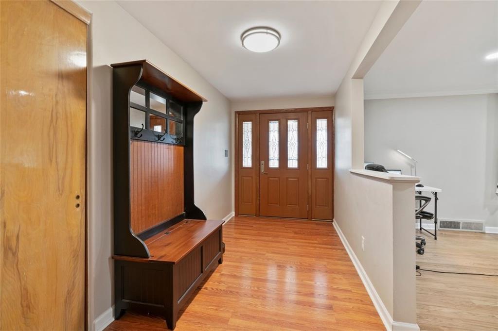 426 Thompsonville Road McMurray, PA 15317 - Photo 3 of 24 The oversized front hallway/entry way is 12'x'6' with beautiful hardwood flooring.