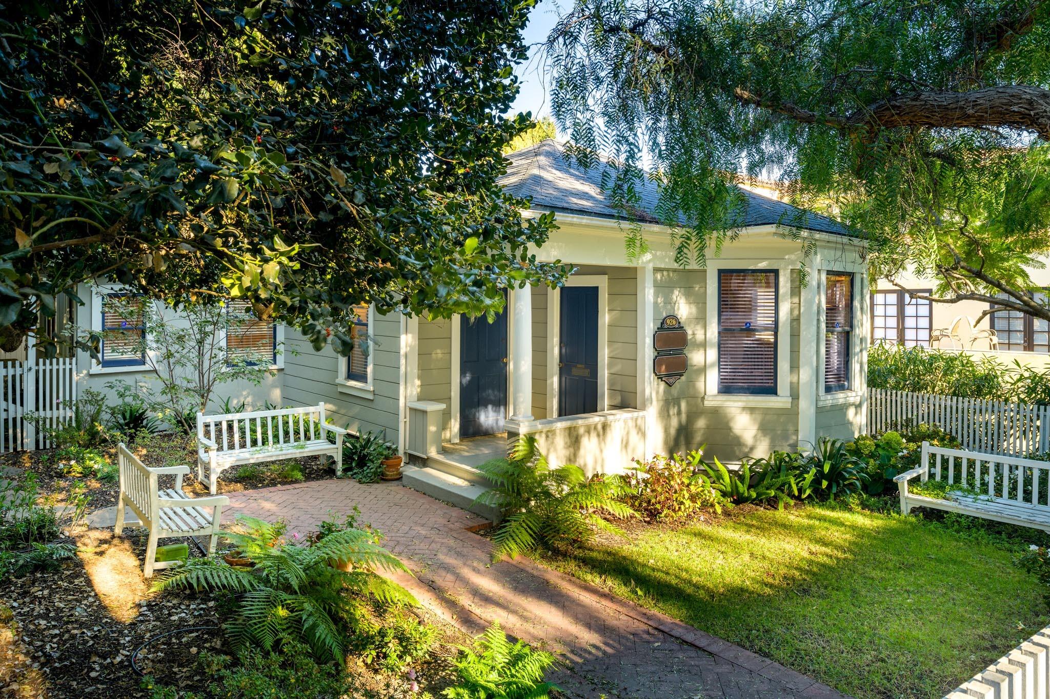 926 Garden Street Santa Barbara, CA 93101 - Photo 2 of 14 a front view of a house with garden