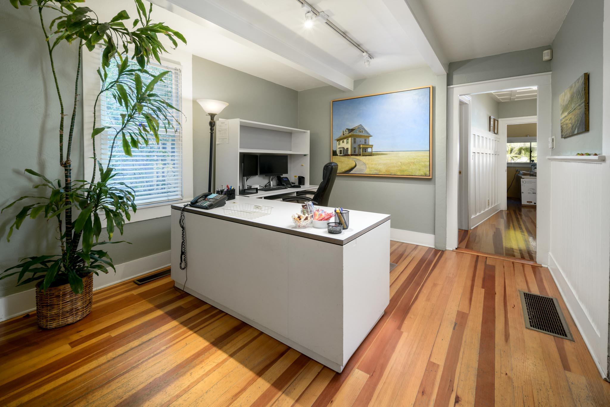 926 Garden Street Santa Barbara, CA 93101 - Photo 3 of 14 a room with kitchen island a counter and a potted plant