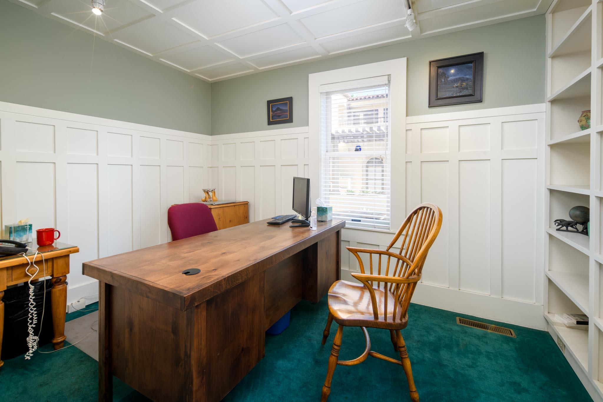 926 Garden Street Santa Barbara, CA 93101 - Photo 9 of 14 a room with a chair and a table