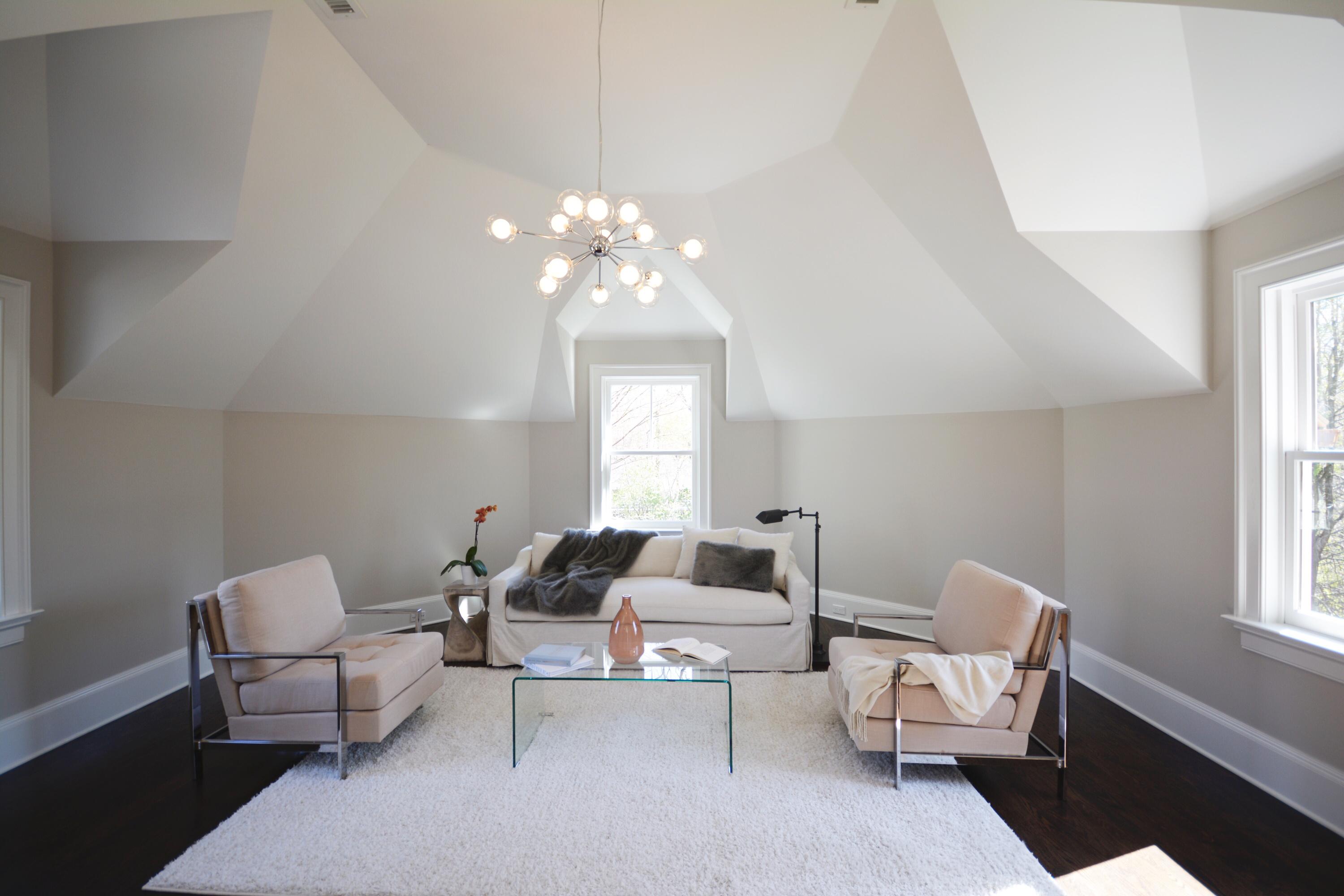 11 Sunswyck Road Darien, CT 06820 - Photo 13 of 25 a living room with furniture a chandelier and a window
