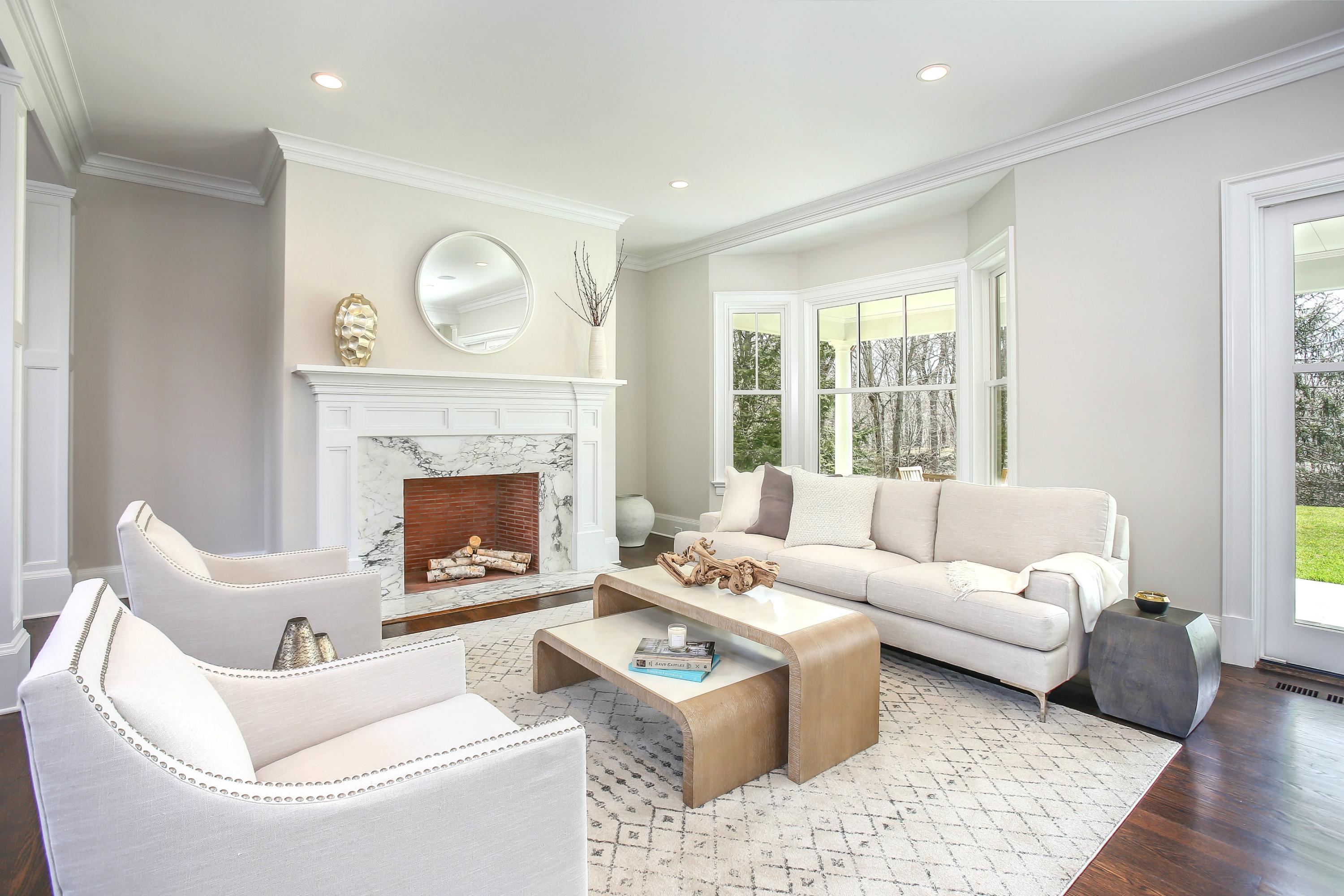 11 Sunswyck Road Darien, CT 06820 - Photo 4 of 25 a living room with furniture and a fireplace