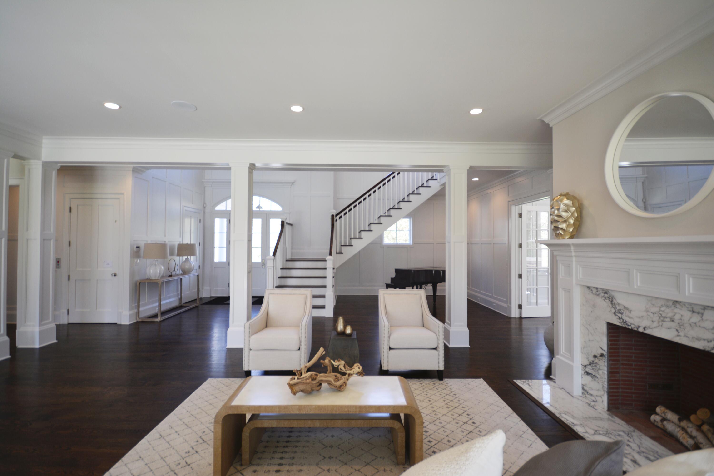 11 Sunswyck Road Darien, CT 06820 - Photo 5 of 25 a living room with furniture and a fireplace