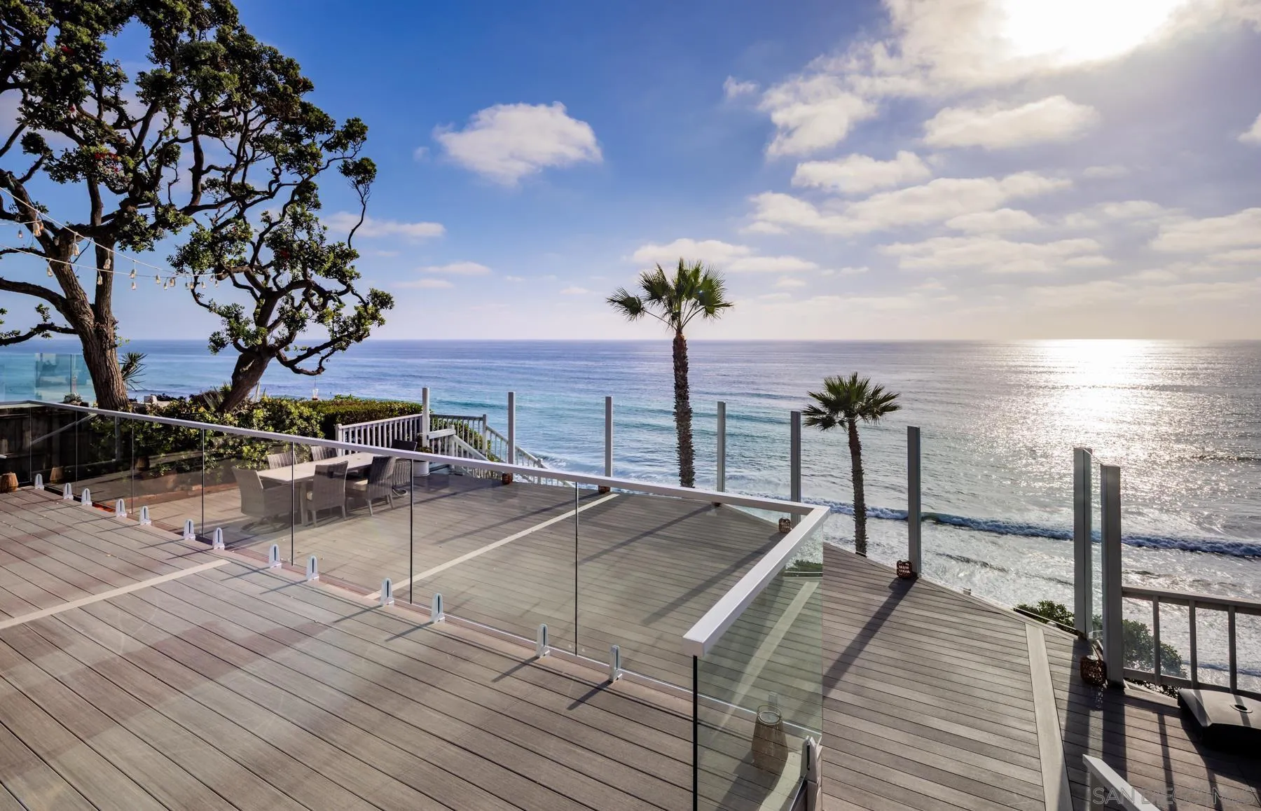 1036 Neptune Avenue Encinitas, CA 92024 - Photo 19 of 34 a view of a terrace with wooden floor and seating space