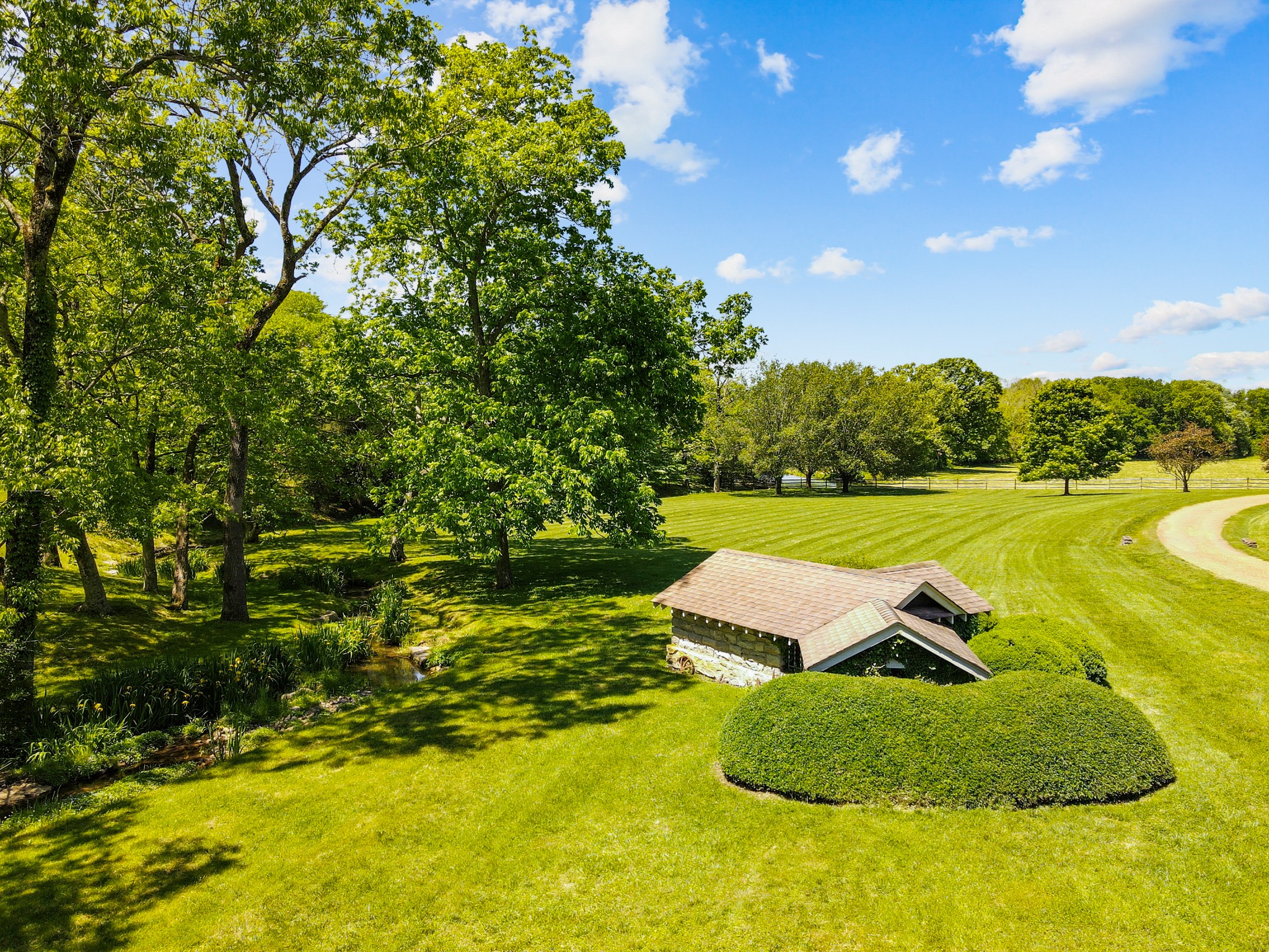 370 Vaughn Road Nashville, TN 37221 - Photo 19 of 27 a view of a lake with a yard
