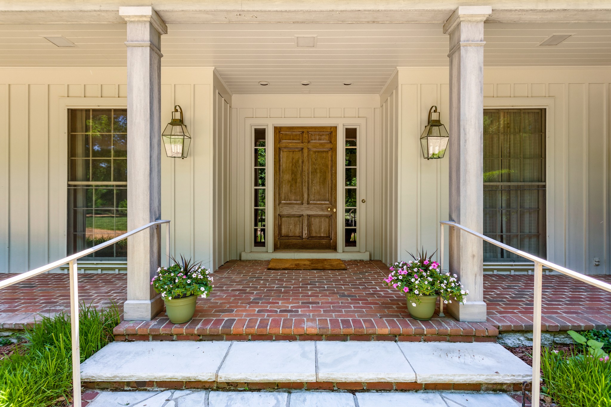 370 Vaughn Road Nashville, TN 37221 - Photo 3 of 27 a front view of a house with a yard