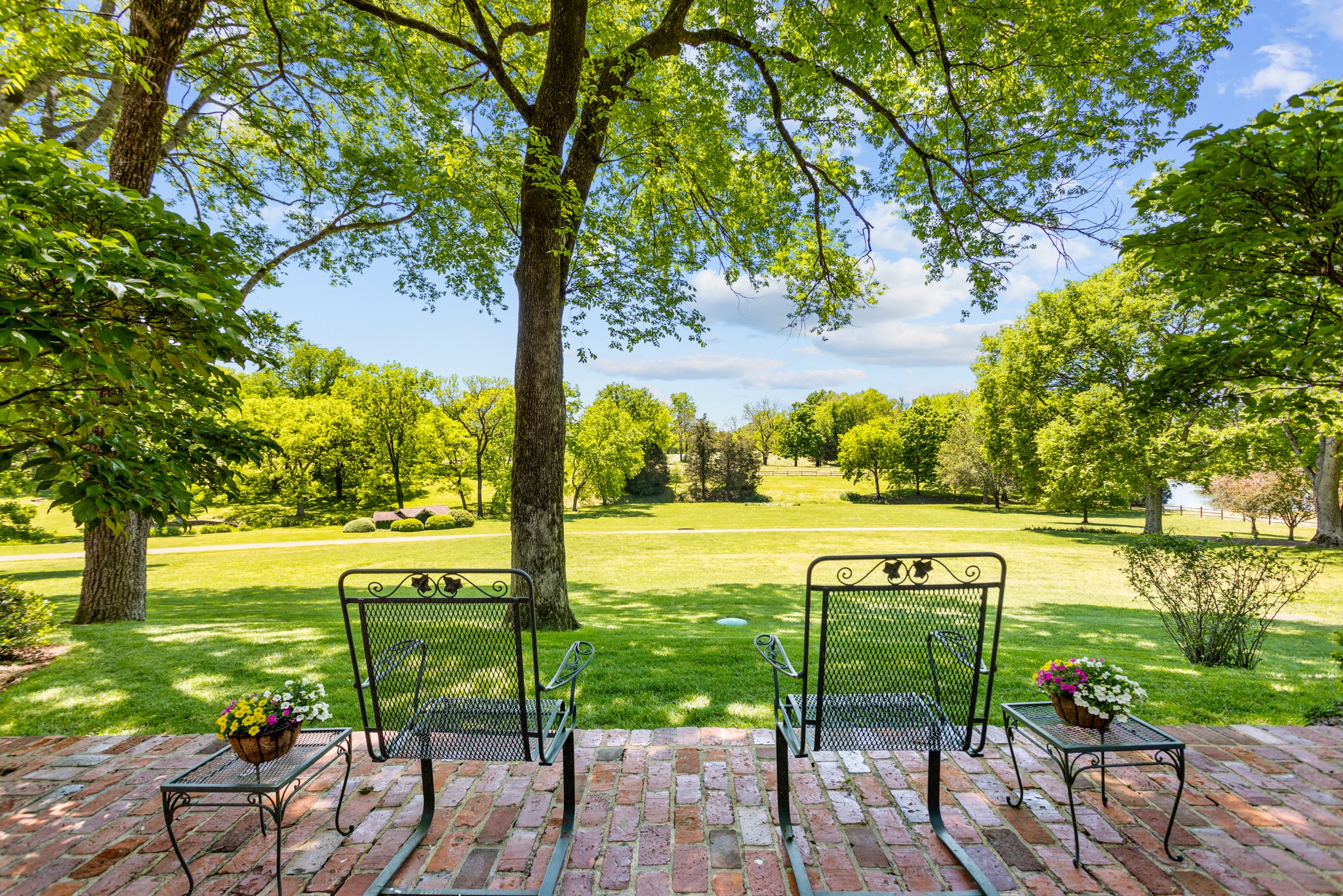 370 Vaughn Road Nashville, TN 37221 - Photo 25 of 27 a view of a lake with a yard