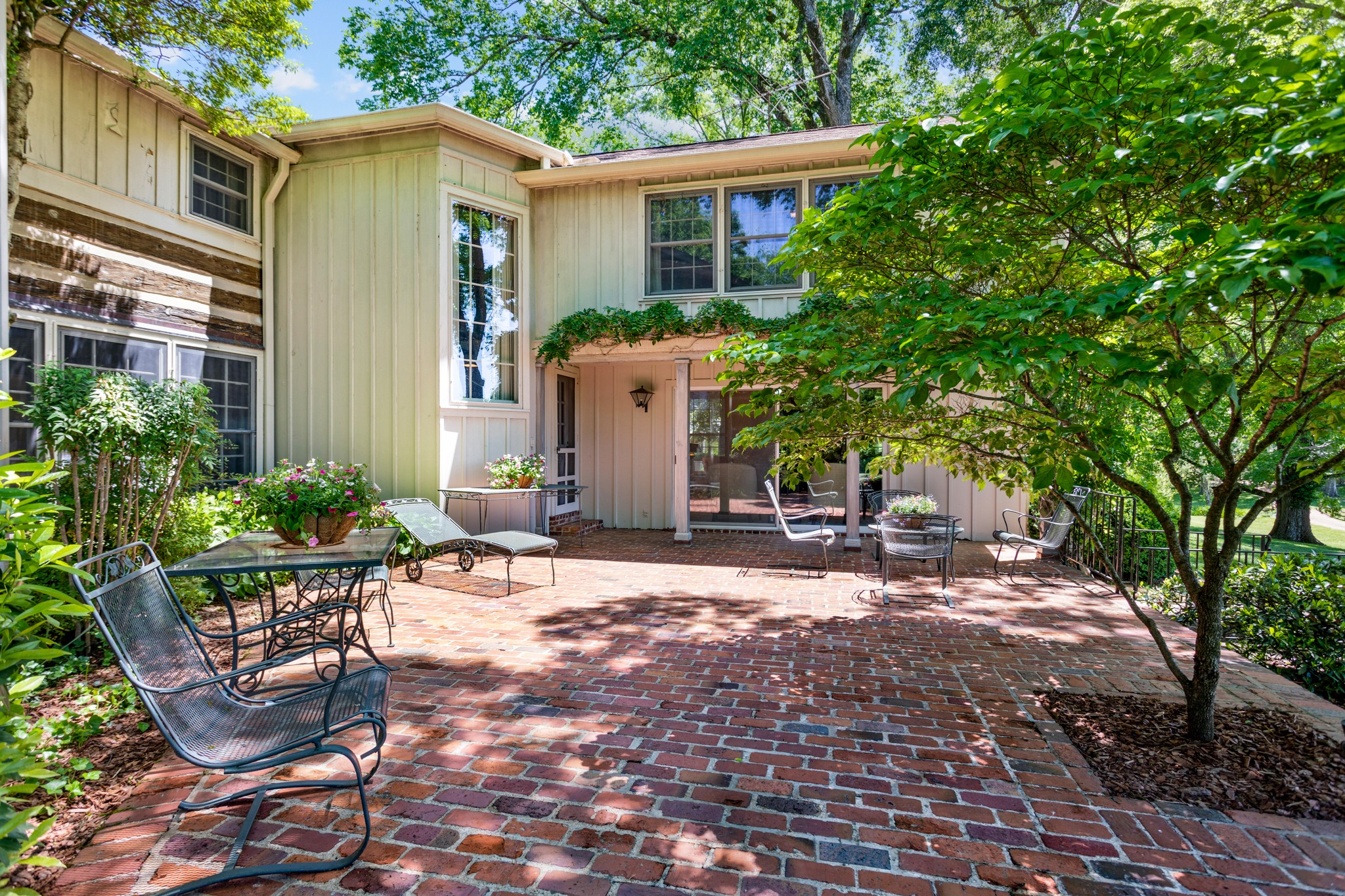 370 Vaughn Road Nashville, TN 37221 - Photo 26 of 27 a view of a house with backyard and sitting area