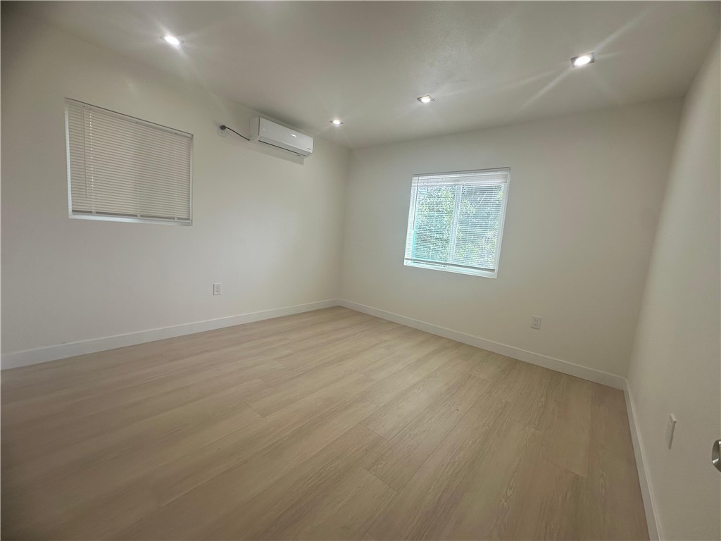 5778 La Sierra Avenue Riverside, CA 92505 - Photo 4 of 8 an empty room with windows