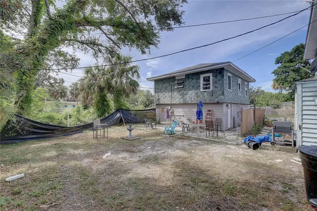 a view of a car park in front of house